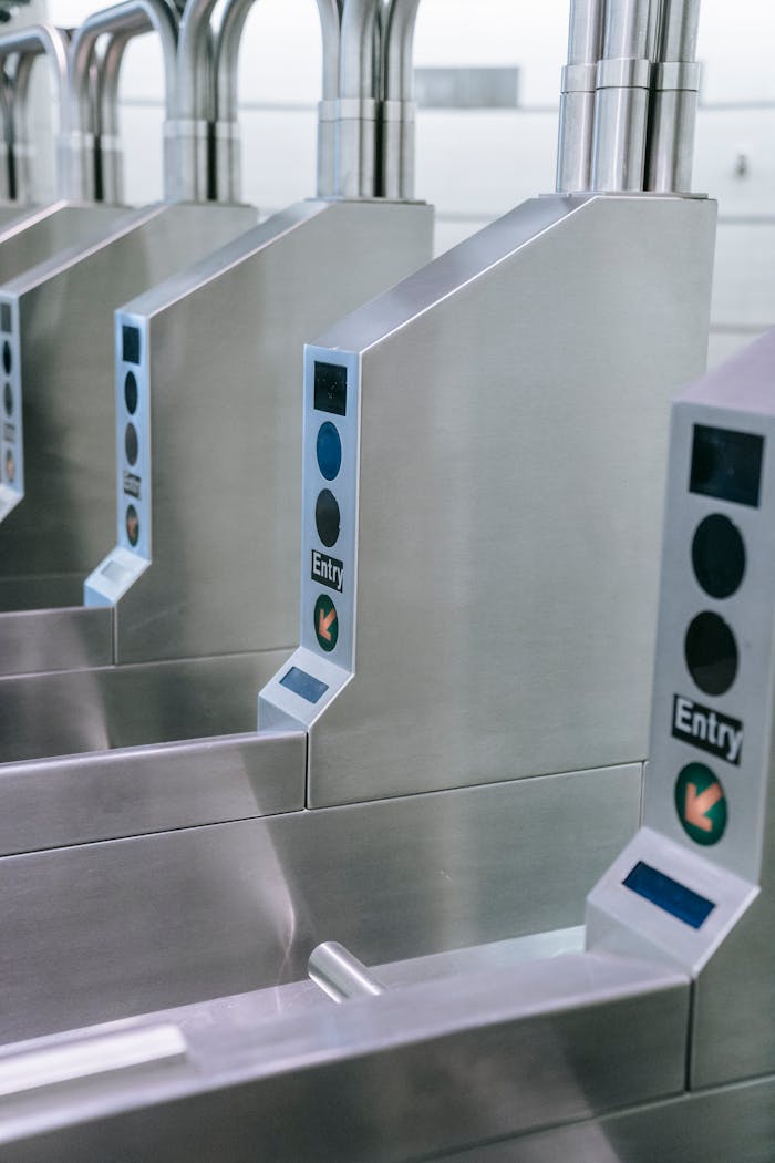 who-we-are Close-up of a contemporary subway turnstile in a station. Modern design and functionality.